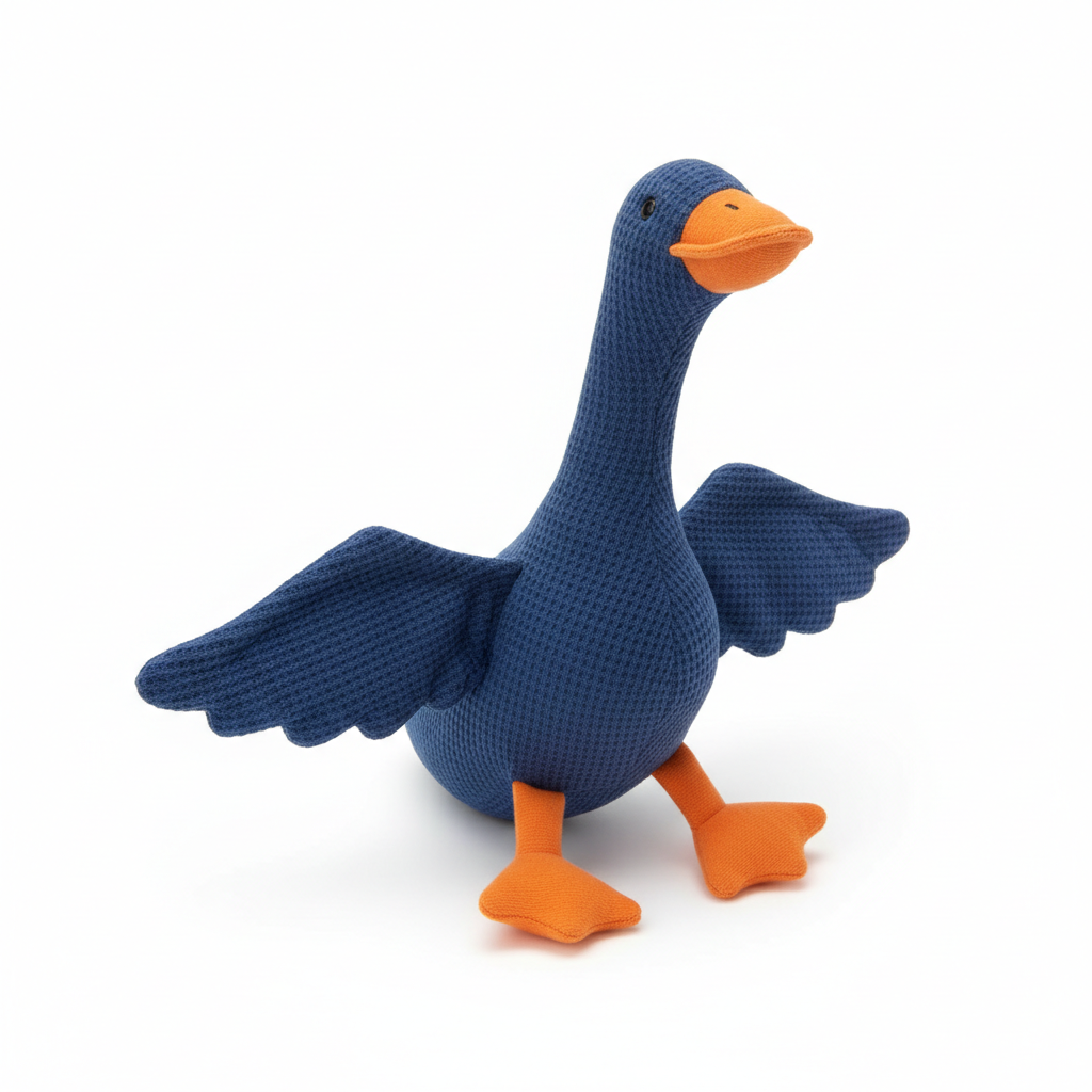 Blue plush squeaky duck dog toy on white background